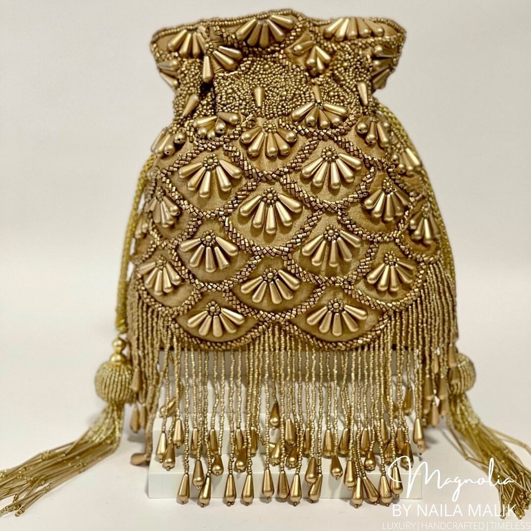 BARIELY | Gold Potli Bag with bead work and gold embellishment |