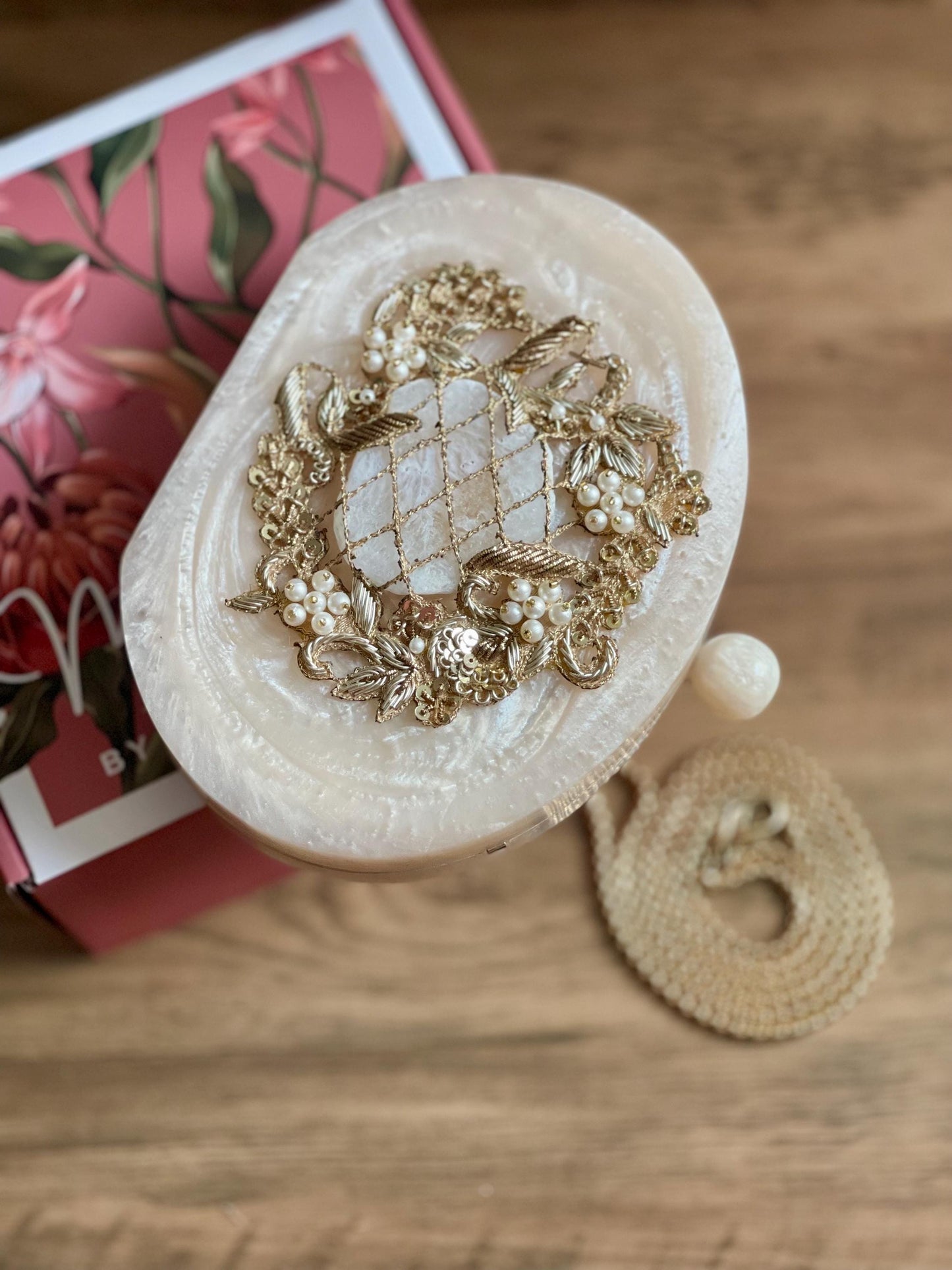 ISLAMABAD | Resin Off White Oval Embellished Stunning Evening Purse
