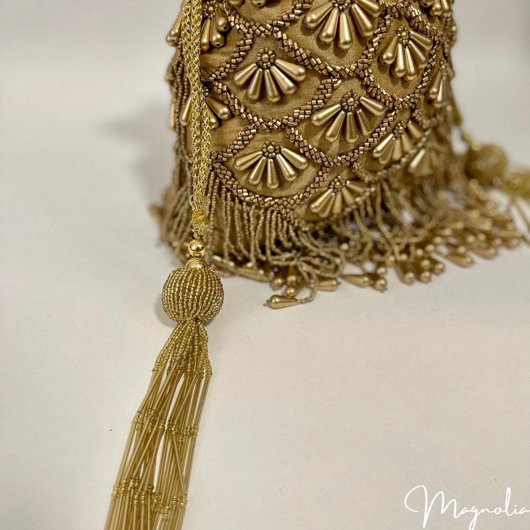 BARIELY | Gold Potli Bag with bead work and gold embellishment |