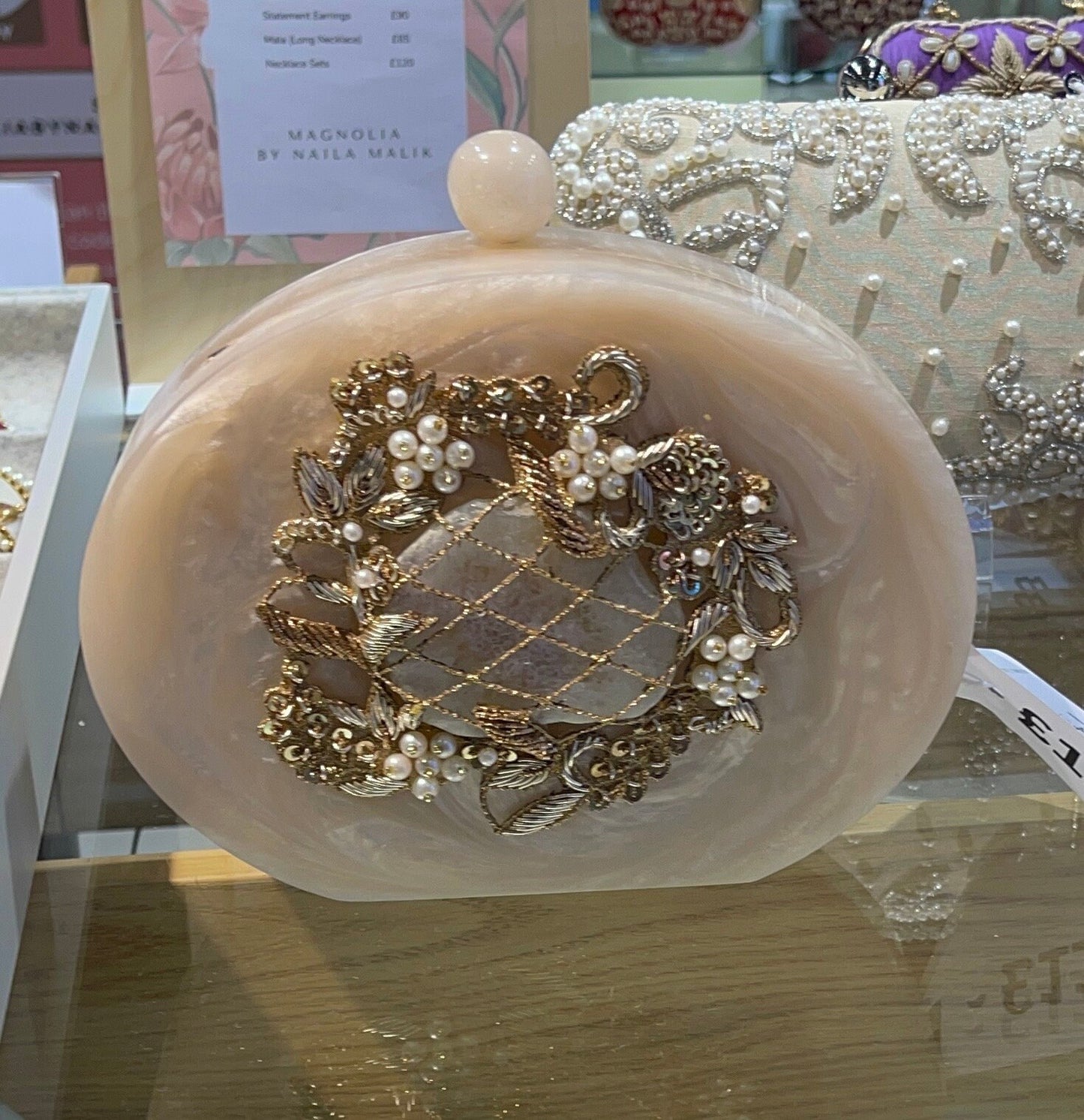 ISLAMABAD | Resin Off White Oval Embellished Stunning Evening Purse
