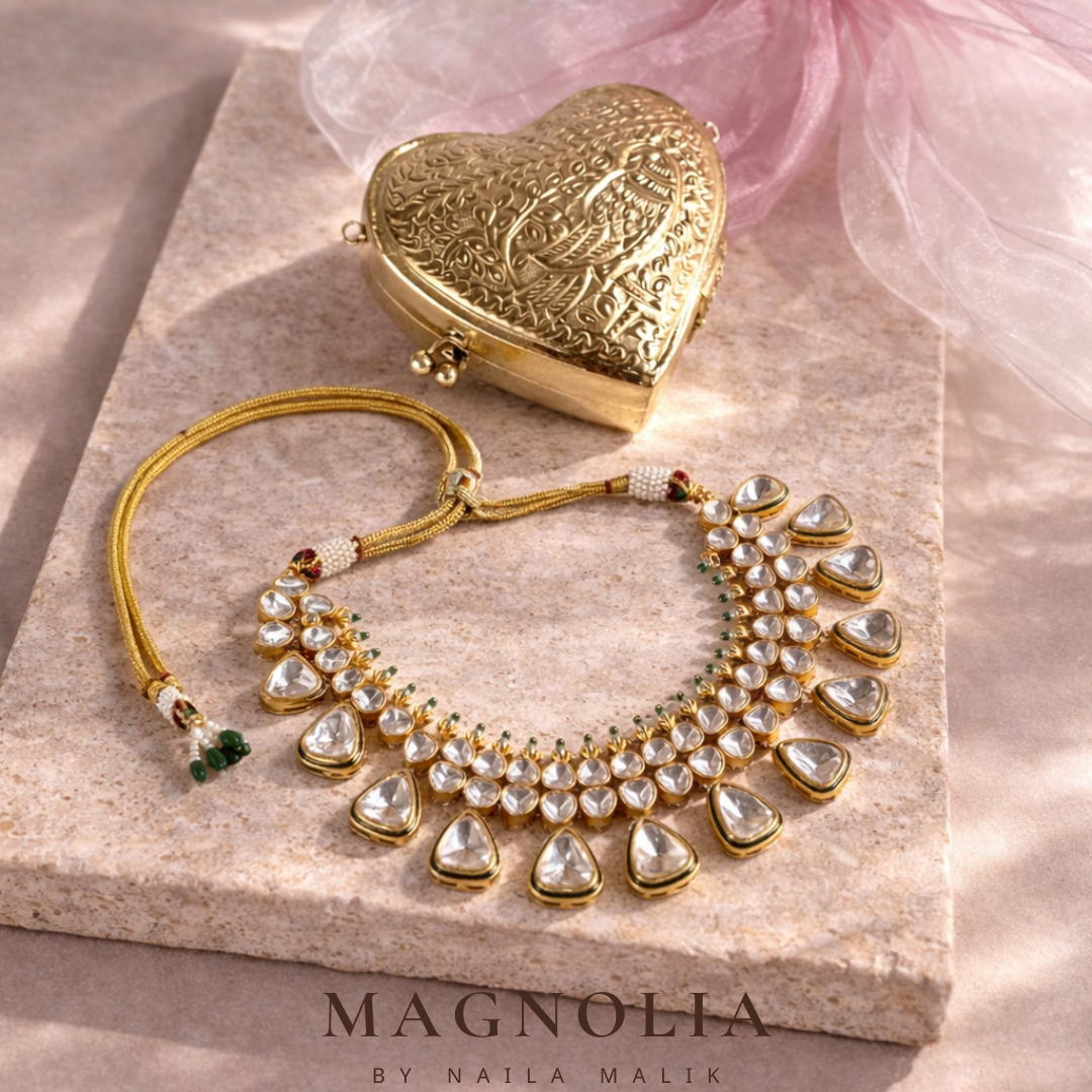 FIERA DAS AVES | Heart Shape Gold Engraved Bird Purse