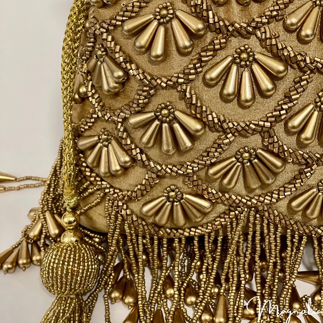 BARIELY | Gold Potli Bag with bead work and gold embellishment |