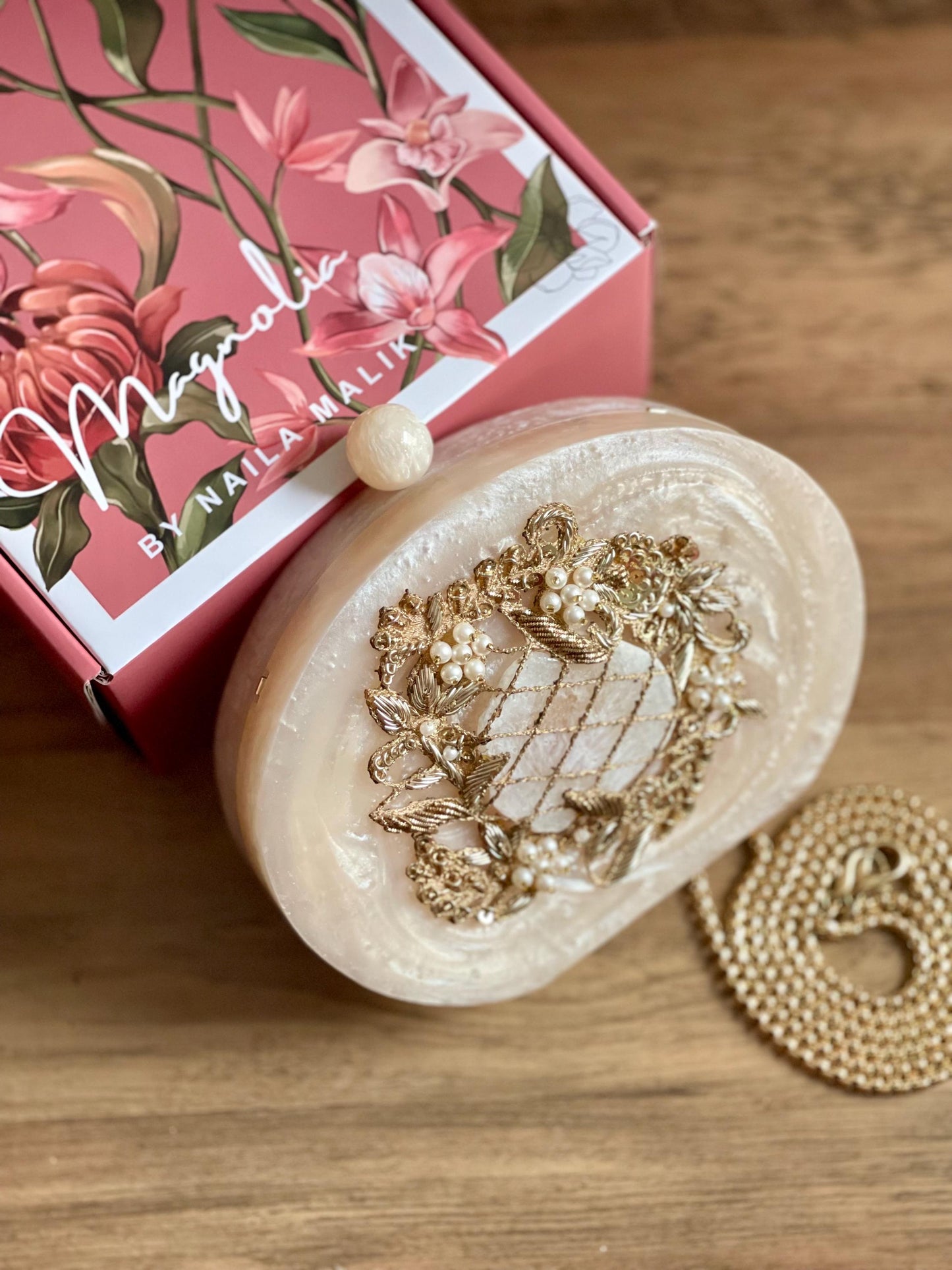 ISLAMABAD | Resin Off White Oval Embellished Stunning Evening Purse
